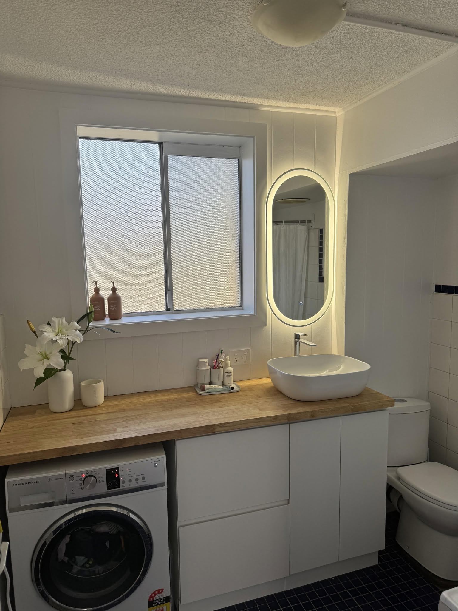 Bathroom renovation with timber vanity bench