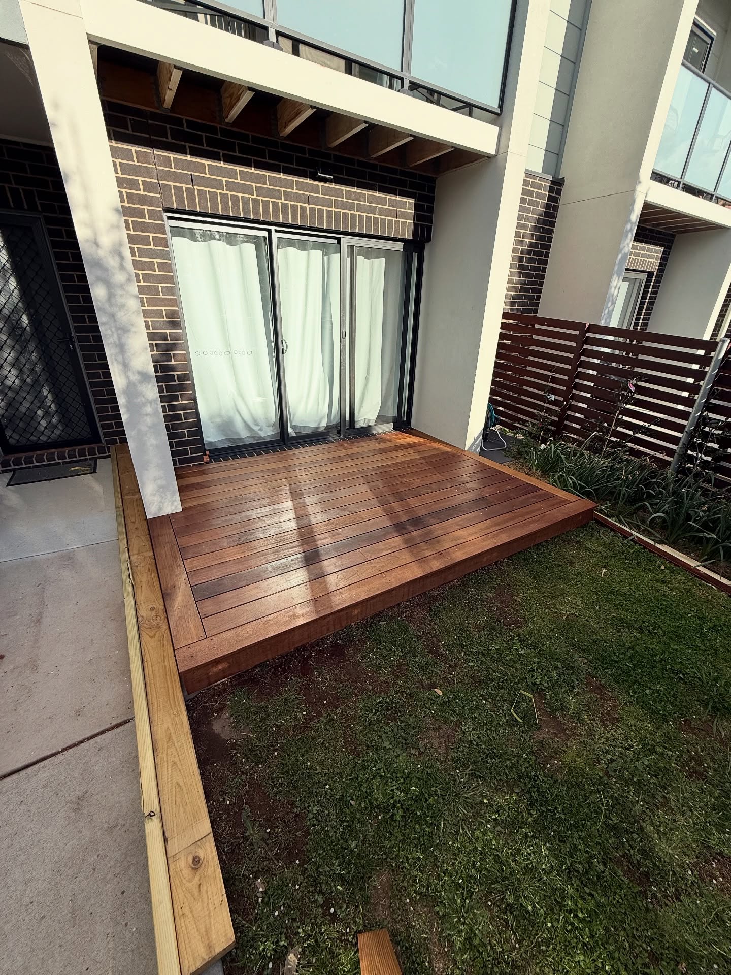 Finished timber deck beside the home